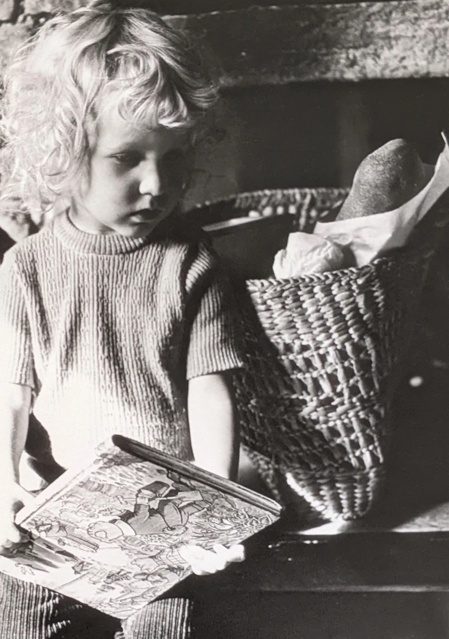 photograph of a child deep in thought
